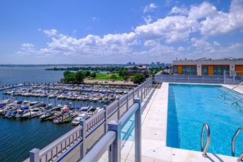 A rooftop with pool and elegant sundeck, creates a sanctuary with panoramic views of the potomac and anacostia rivers, and the national mall